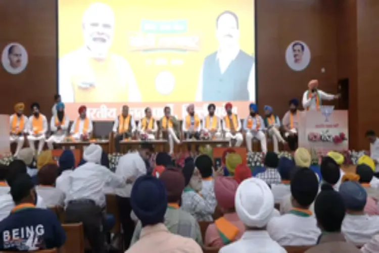 Members of the Delhi Sikh Gurudwara Management Committee with BJP leaders at the BJP's central office in New Delhi