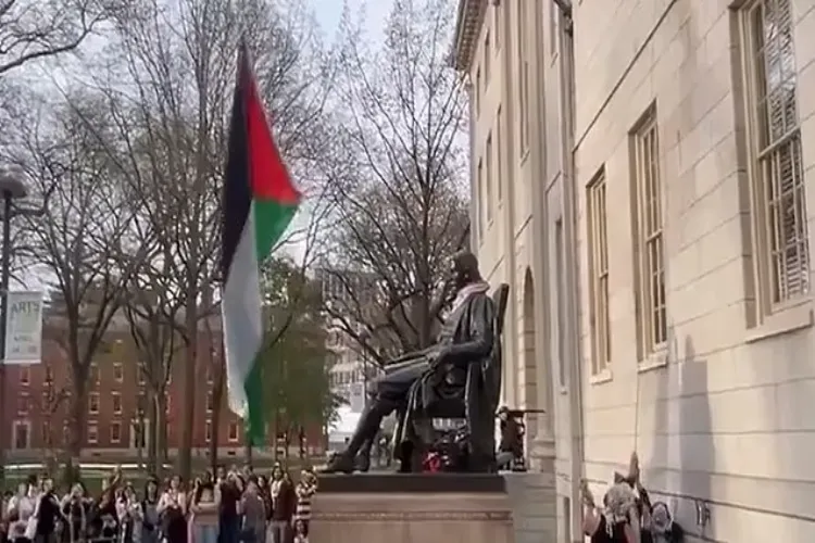 The Palestinian flag was raised over the statue of John Harvard
