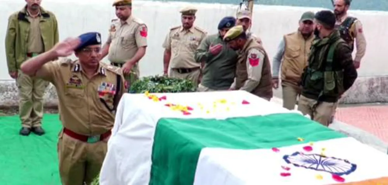 Jammu Police chief ADGP Anand Jain saluting the Coffin of Mohammad Sharif, member of Village Defence Guards
