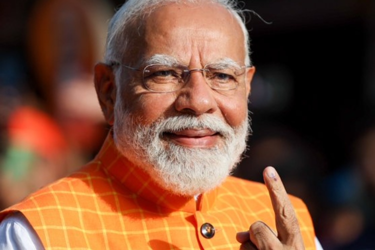 Prime Minister Narendra Modi showing his mark after voting