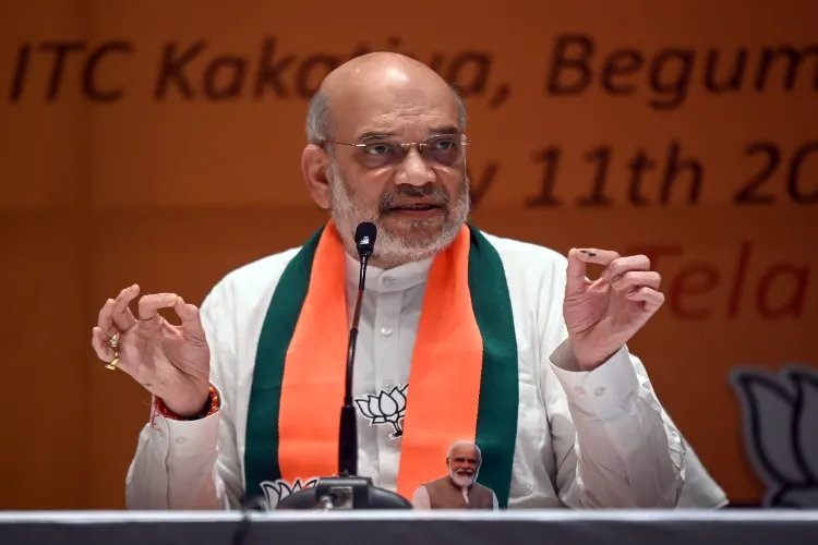 Union Home Minister Amit Shah addresses a press conference, in Hyderabad on Saturday