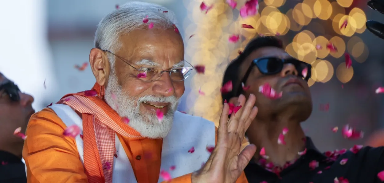 Prime Minister Narendra Modi during his roadshow in Varanasi (BJP:X)