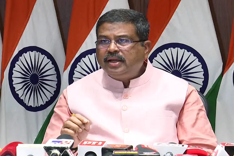 Dharmendra Pradhan addresses a press conference.