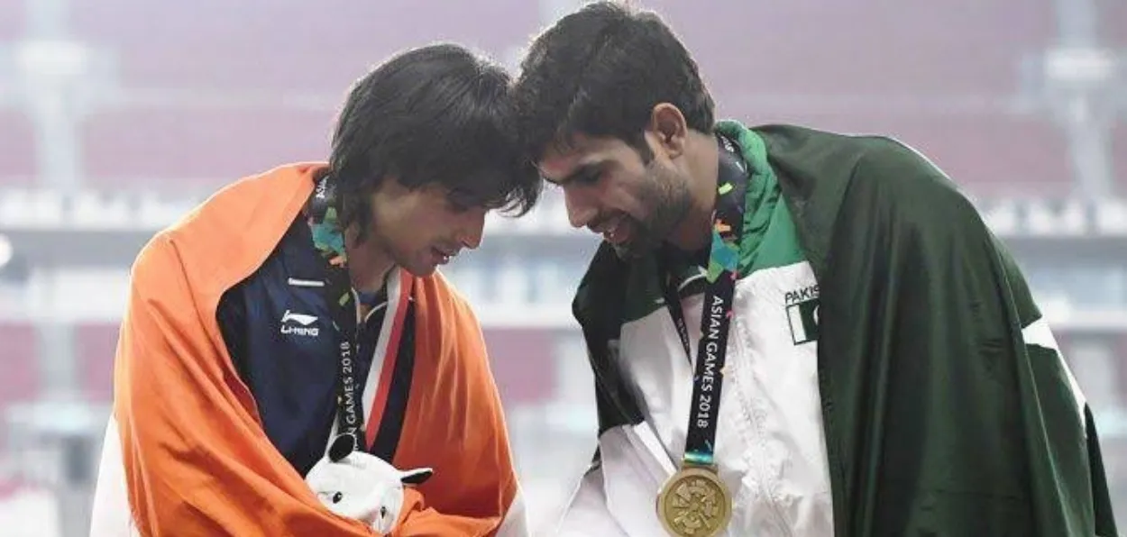 Neeraj Chopra and Nadeem Ashraf shaking hands after winning silver and gold in Jabeline throw at Patis Olympics respectively