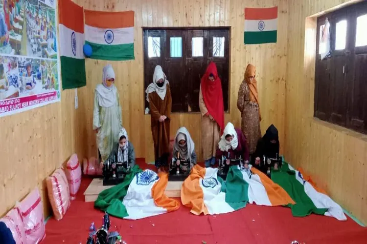 A group of women stitching the Indian flag ahead of I-Day in Kashmir