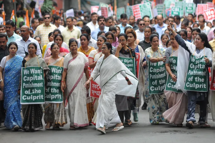 Chief Minister Mamata Banerjee leading a protest march in Kolkata
