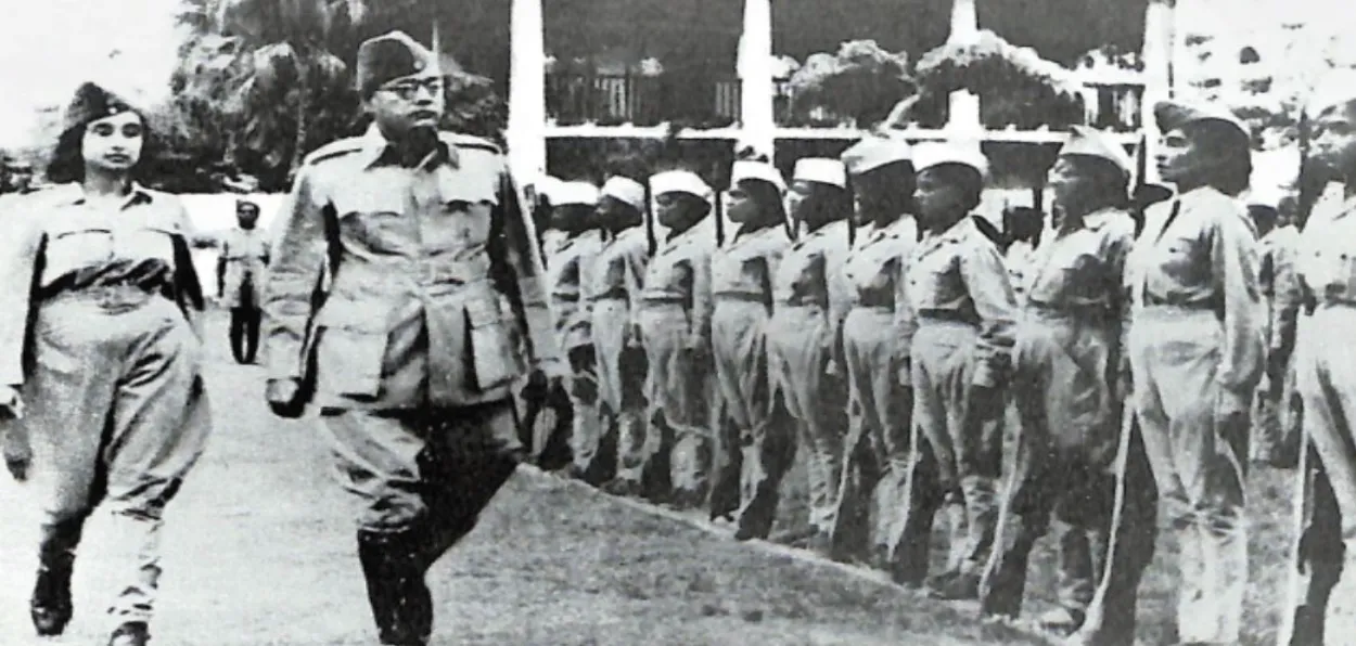 Subhas Chandra Bose, with Captain (Dr) Lakshmi Sahgal, inspecting the guard of honour presented by the Rani of Jhansi Regiment