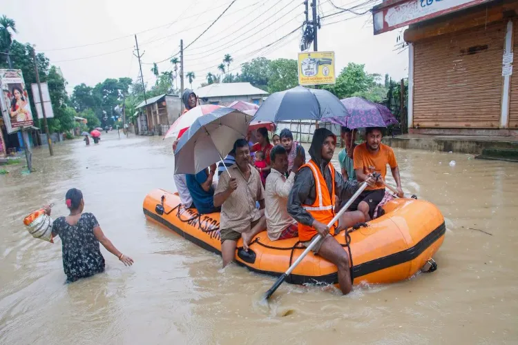 Flood-affected people being moved to a safer place during a rescue operation 