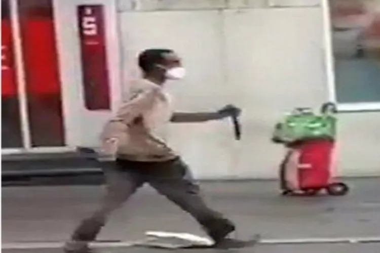 A man who stabbed people in Germany caught on camera (Pic released by German Police on X)