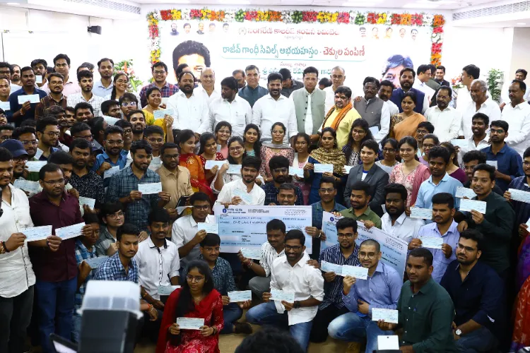 Candidates who qualified the Civil services prelims flaunting their reward cheques