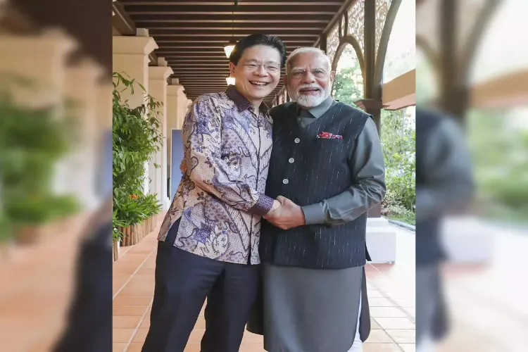 Prime Minister Narendra Modi embraced Singaporean counterpart Lawrence Wong 