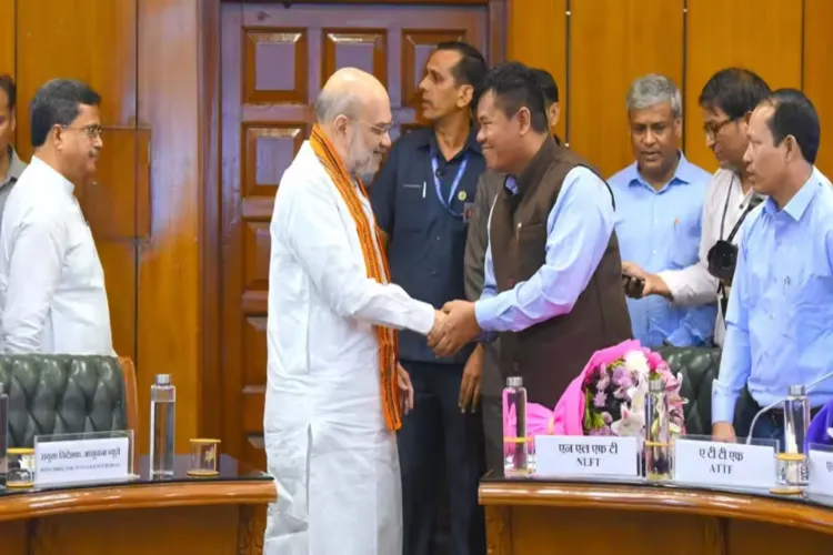 Home Minister Amit Shah, Tripura CM Manik Saha with the leaders  of NLFT, ATTF