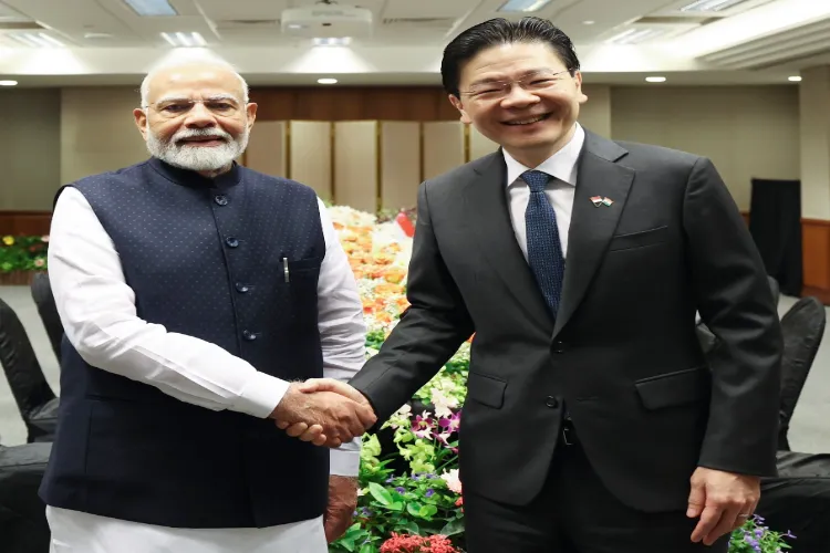 Prime Minister Narendra Modi with Singapore's PM Lawrence Wong