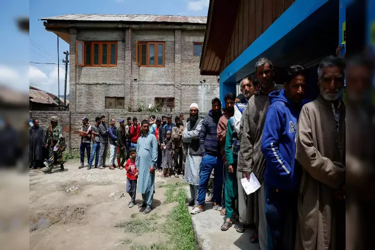 People line up to cast their vote in Kashmir