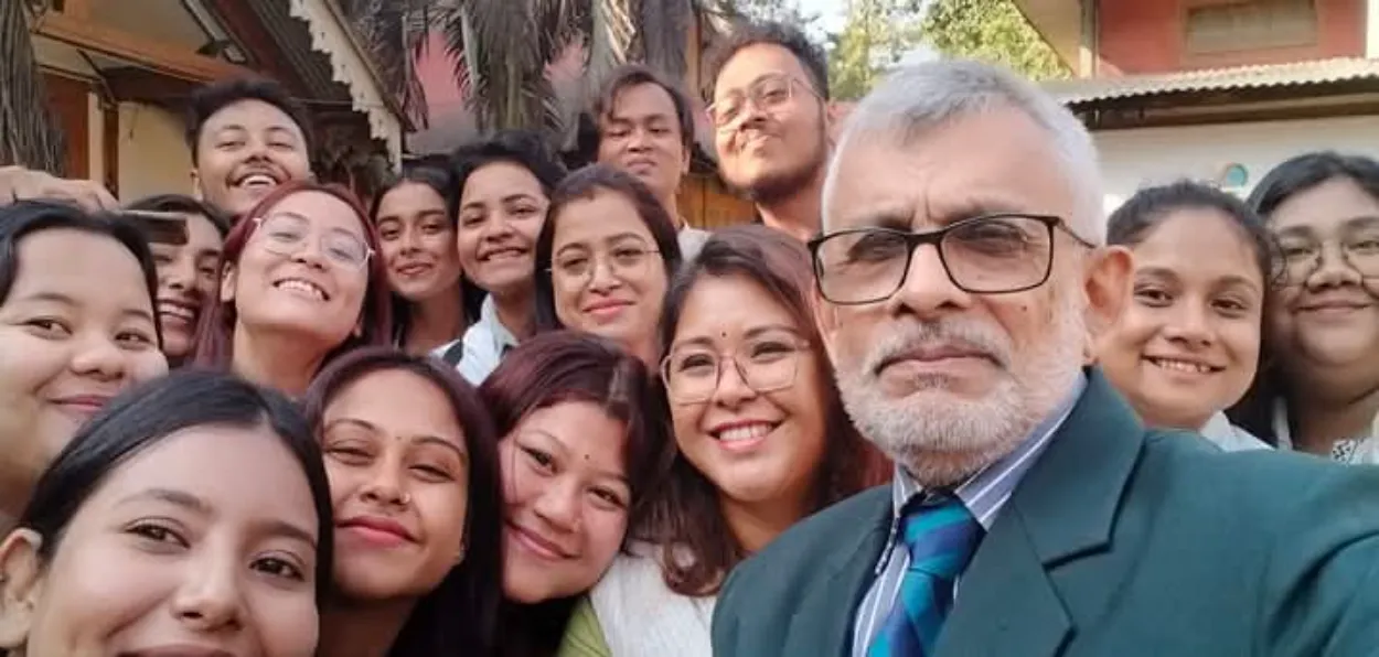 Nurul Islam Laskar clicking a selfie with students of Cotton University, Guwahati