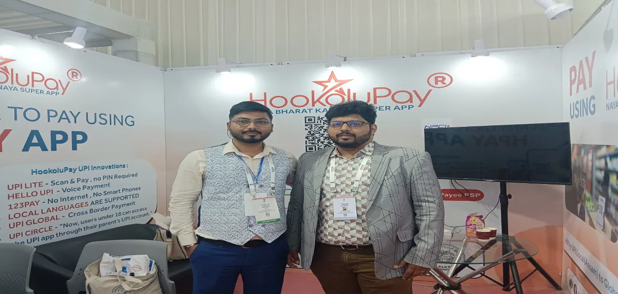 Ali and Anand Kannan displaying HookoluPay at Advantage Assam conclave