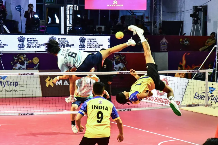 Tussle between India and China during a match at ISTAF 'Sepak Takraw' World Cup 2025 in Patna.