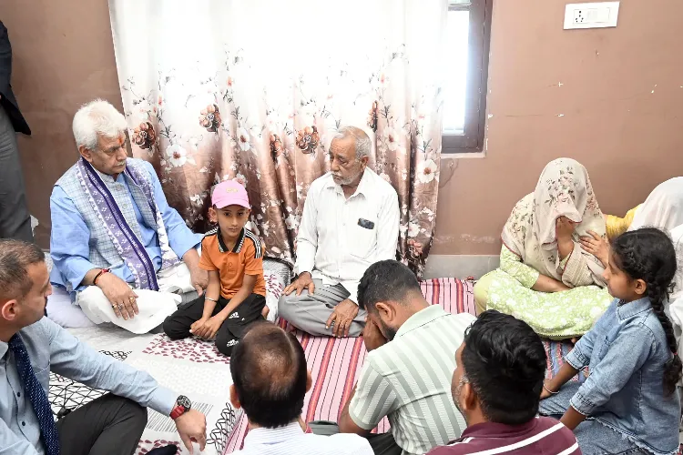 LG Manoj Sinha with the family of a Kathua martyr 