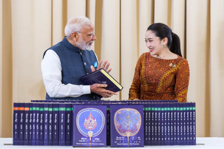 PM Narendra Modi being presented a copy of the Tipitaka in Pali by Thailand's PM Paetongtarn Shinawatra at the Government House in Bangkok on Thursday