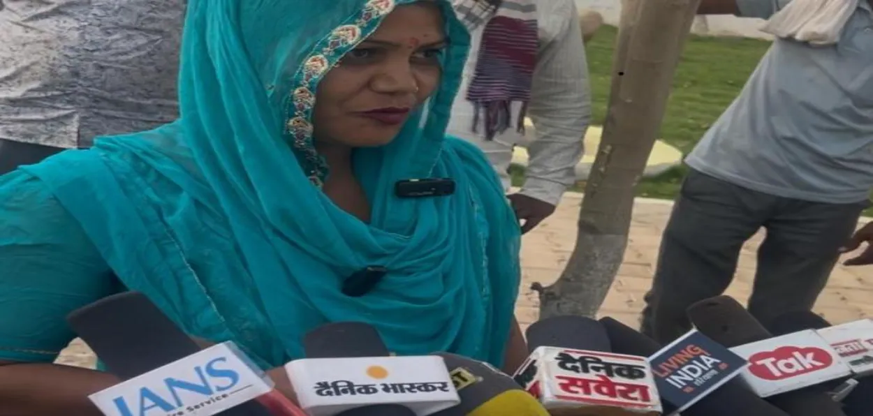 Nisha Chauhan speaking to the media after her election
