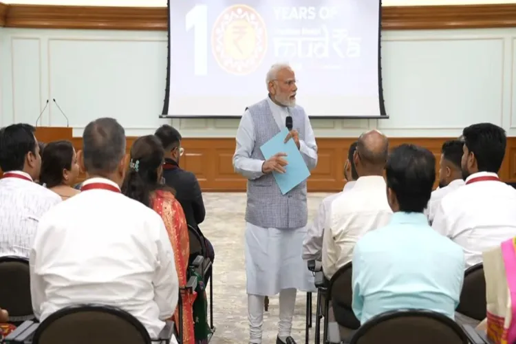 Prime Minister Narendra Modi with MUDRA Yojana beneficiaries