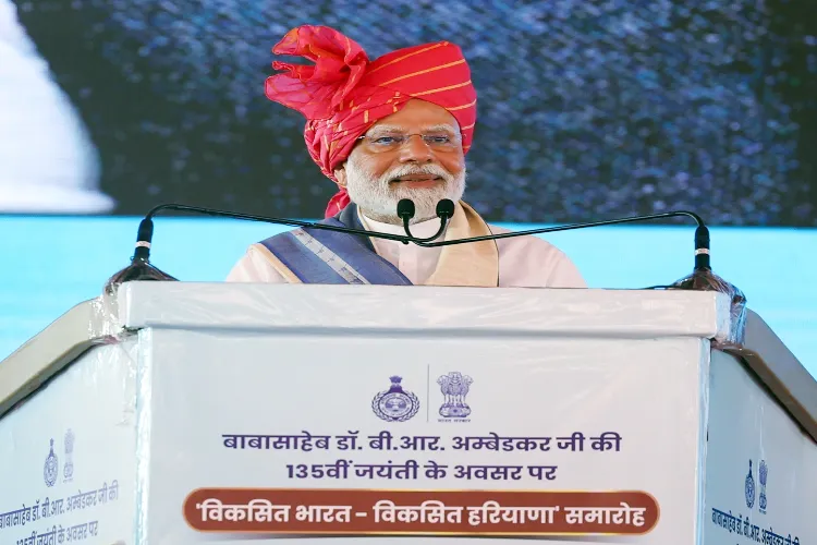 Prime Minister Narendra Modi addresses the gathering during an event to mark the launch of multiple projects in Haryana, in Yamuna Nagar on Monday.