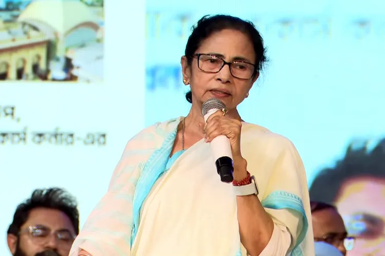 West Bengal Chief Minister Mamata Banerjee speaks during the inauguration of the Kalighat Skywalk, at Kalighat in Kolkata on Monday.