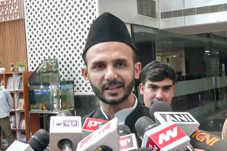 Samajwadi Party (SP) MP Zia Ur Rehman Barq speaks to the media as he arrives to present before the Judicial Inquiry Commission after being summoned, in Lucknow on Wednesday.