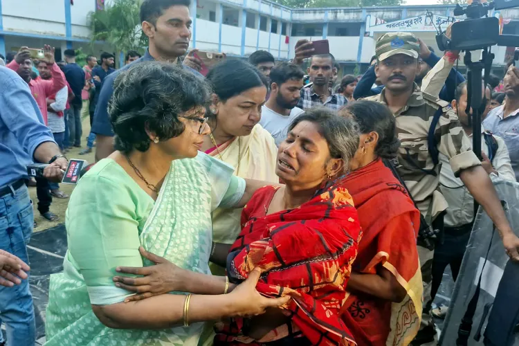 National Commission for Women (NCW) Chairperson Vijaya Rahatkar meets the families affected by the Murshidabad violence at a shelter home, in Malda on Friday. 