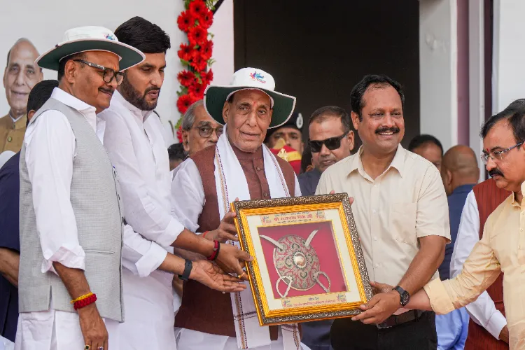Defence Minister Rajnath Singh with Uttar Pradesh Deputy Chief Minister Brajesh Pathak during the inauguration of Sansad Khel Mahakumbh, at K.D. Singh Babu Stadium, in Lucknow, Saturday, April 19, 2025.