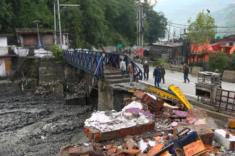 Damage after a landslide near the Srinagar-Jammu National Highway after a landslide, in Ramban, Monday.