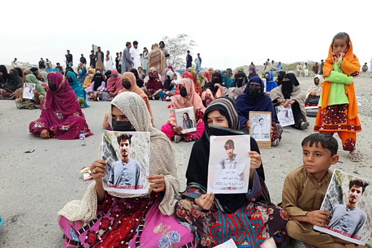 Members of the Baloch Yakjehti Committee stage a sit-in protest over alleged Pakistan's atrocities against Baloch people, in Balochistan recently.