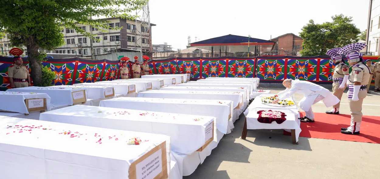 Union Home Minister Amit Shah pays last respects to the deceased of the Pahalgam terror attack, in Srinagar on Wednesday.