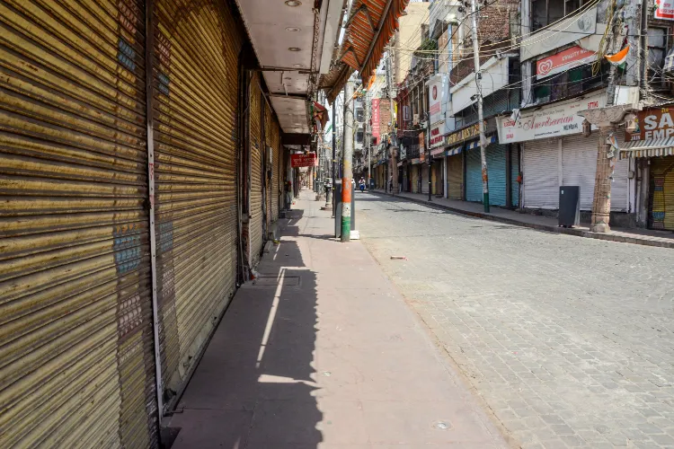 A view of closed shops on a deserted road during shutdown following the Pahalgam terror attack that took place on Apr 22, leaving several people dead and many injured, in Jammu on Wednesday.