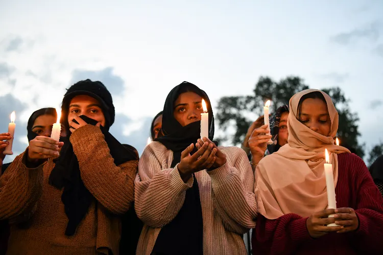 People hold a candlelight vigil for the victims of Pahalgam terror attack in Srinagar on Wednesday.