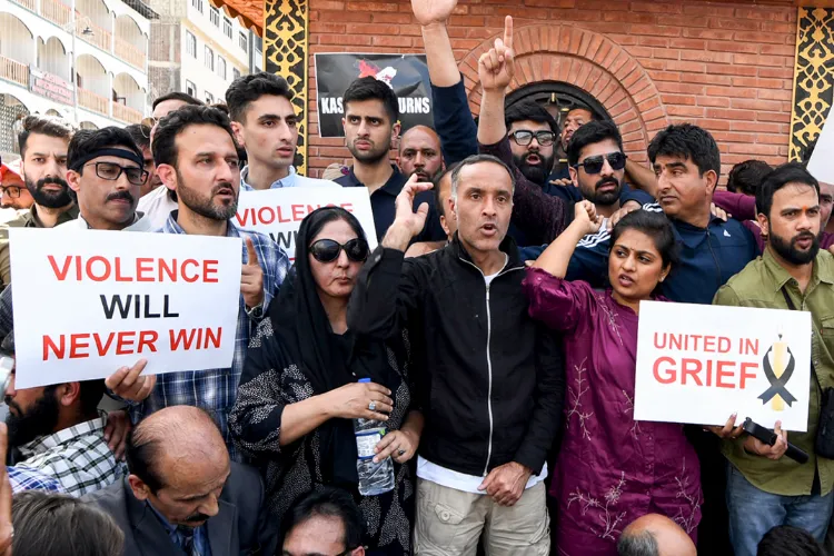 Jammu and Kashmir Chief Minister Omar Abdullah's sons Zamir Abdullah and Zahir Abdullah along with supporters protest against the Pahalgam terror attack in Srinagar on Wednesday.