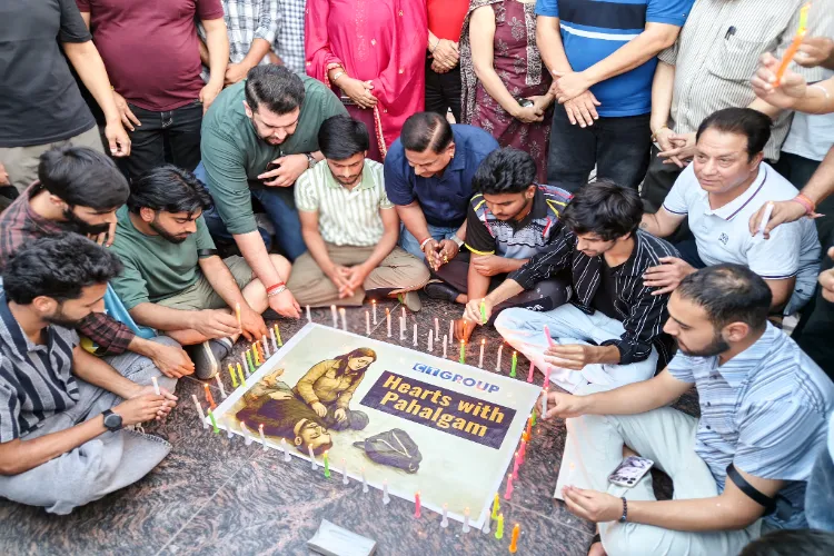 People hold a candlelight vigil for the victims of Pahalgam terror attack, in Jalandhar on Wednesday.