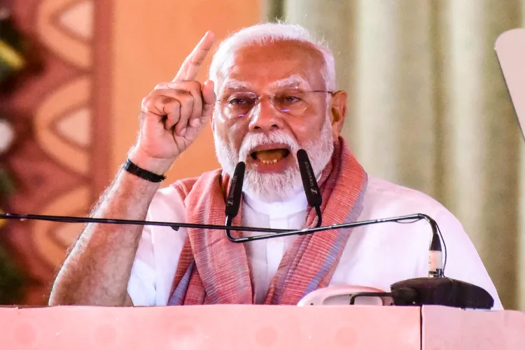 Prime Minister Narendra Modi addresses during a National Panchayati Raj Day event, in Madhubani, April 24, 2025.