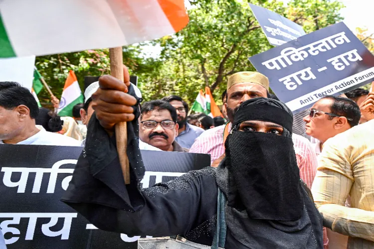 Anti-Terror Action Forum members stage a protest against the Pahalgam terror attack near the Pakistan High Commission in New Delhi on Thursday.
