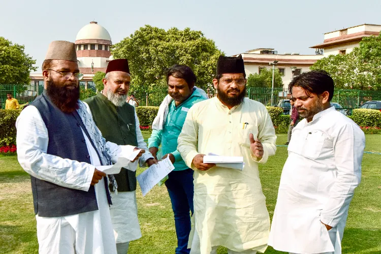 Petitioners at Supreme court premises following SC's hearing on the Waqf (Amendment) Act 2025, in New Delhi.