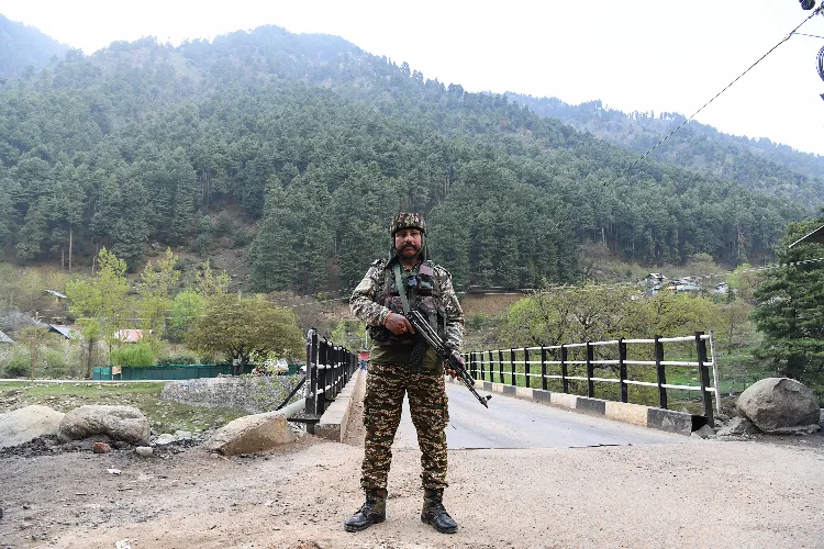 Security personnel stand guard near the incident site after terrorists targeted tourists in J&K's Pahalgam.