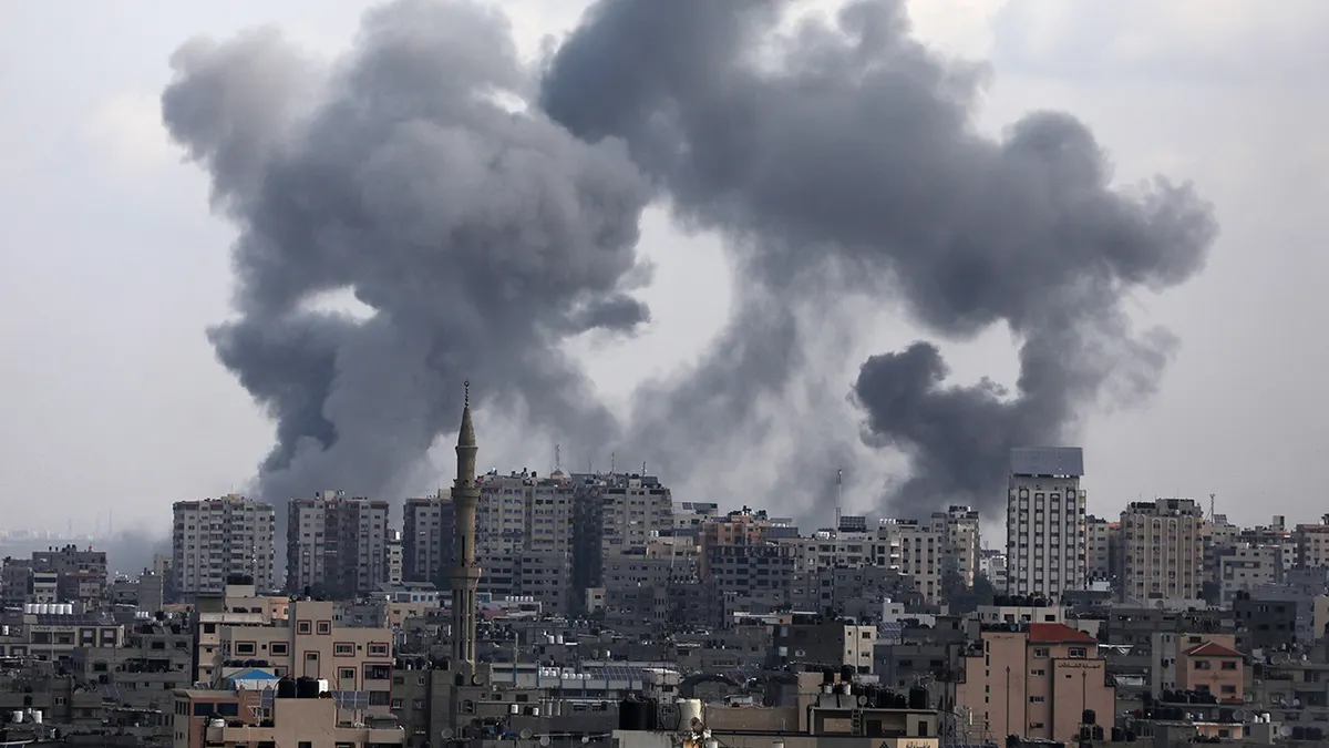 Smoke rises following Israeli strikes in Gaza.