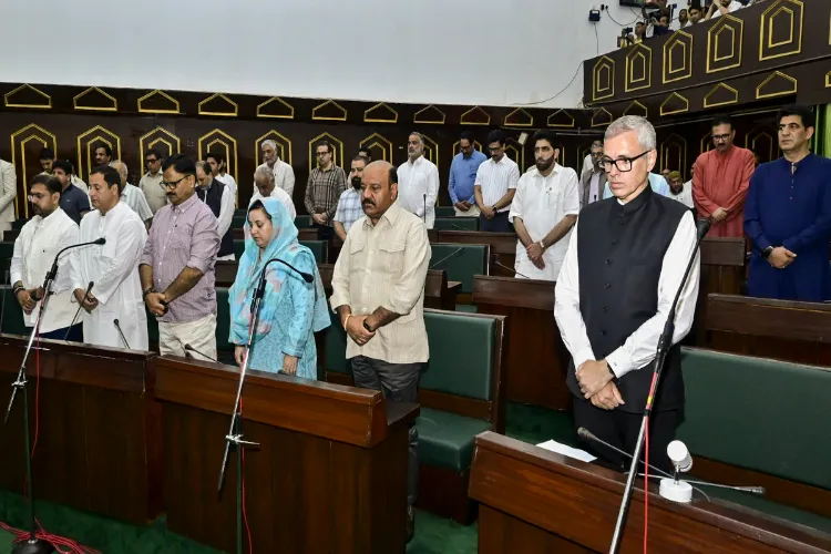J&K MLAs observing one-minute silence during the one-day special session of the Assembly summoned to condemn the Pahalgam terror attack, Jammu, Monday.