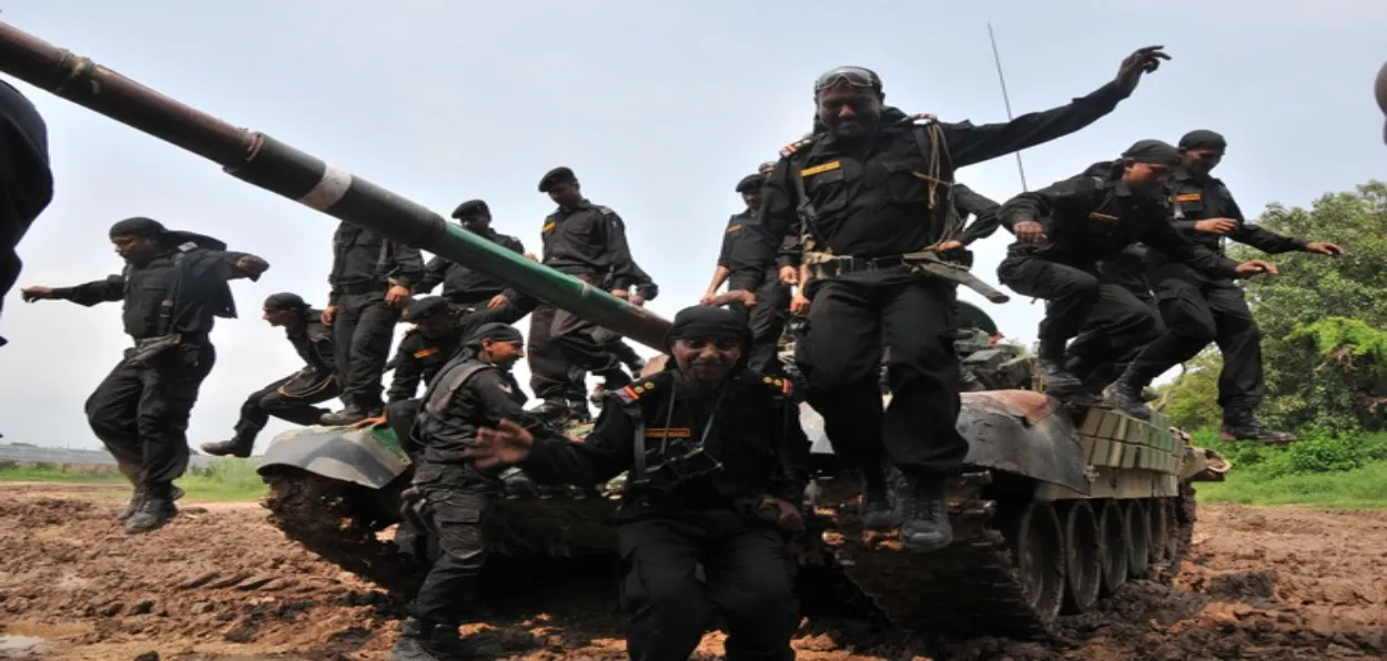 1Army personnel in jubilant mood get off a tank during an event to mark the 1965 Indo-Pak war victory in Jammu