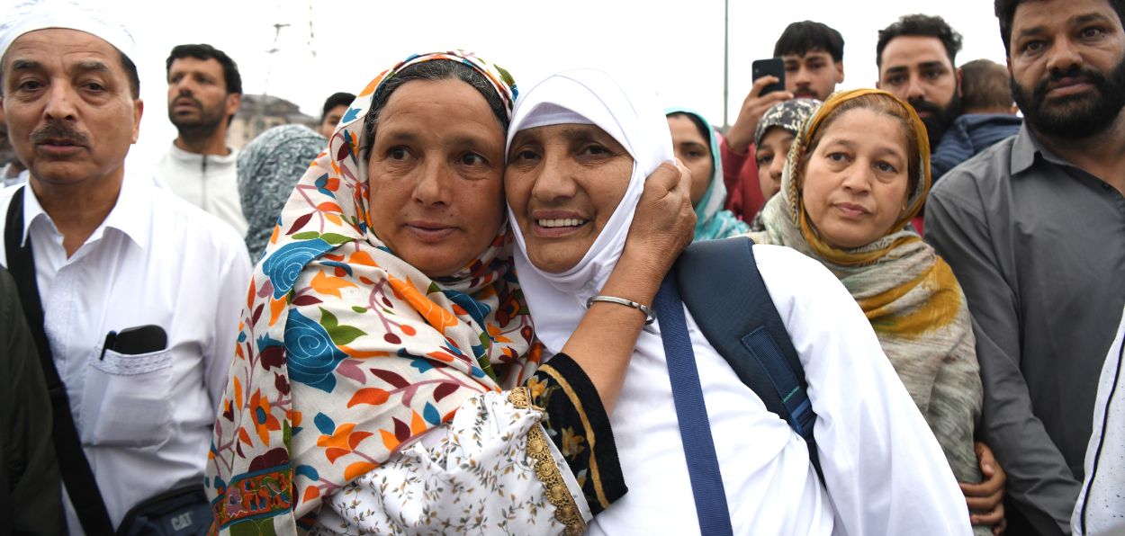 A mother bidding farewell to her daughter as she embarks on Hajj pilgrimage at Srinagar airport (All Pics Basit Zargar)