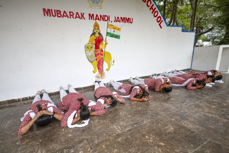 School students take part in a drill as they prepare for the nationwide civil defence drill