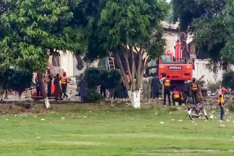 JCB deployed to clear rubble extricate dead at the LeT facility at Muridkey, Pakistan, after it was mombed by India