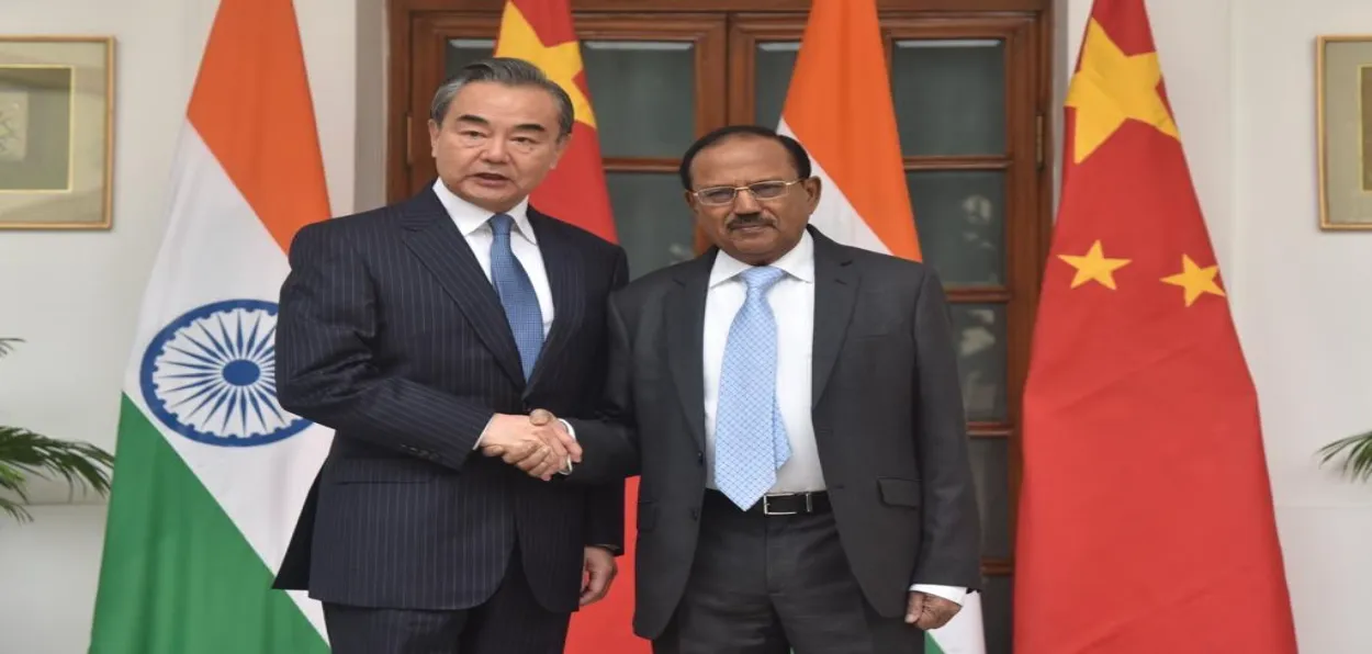NSA Ajit Doval with State Councillor and Foreign Minister Wang Yi in New Delhi (file)