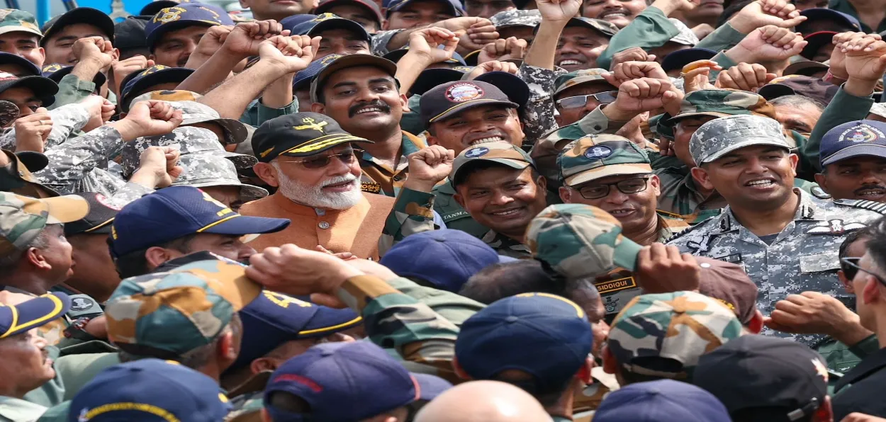 Prime Minister Narendra Modi with Indian Air Force men at Adampur Airbase celebrating India's successful strikes in Pakistan