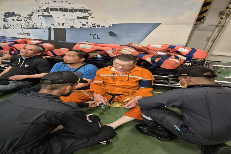 Crew of the Liberian container being given treatment by the Indian Coast Guard